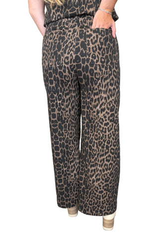Leopard print pants featuring front pockets