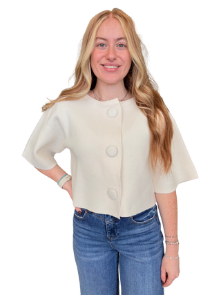 Solid short sleeve sweater jacket with button closure at front