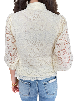 Lace ¾ balloon sleeve top with a stand collar and frog button closure