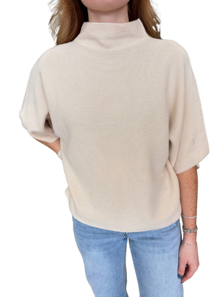 Solid mock neck short sleeve sweater knit top featuring dolman sleeves