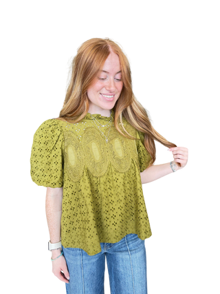 Solid short puff sleeve top with a ruffled neckline