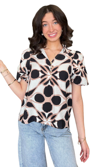 Printed short sleeve top featuring front button detail