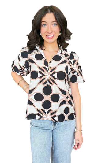 Printed short sleeve top featuring front button detail