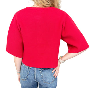 Solid short sleeve sweater jacket with button closure at front