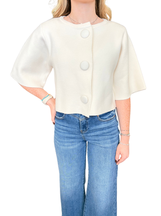 Solid short sleeve sweater jacket with button closure at front