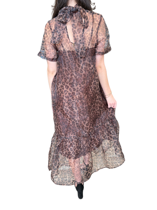 Leopard print short sleeve midi dress featuring scarf tie at back neck