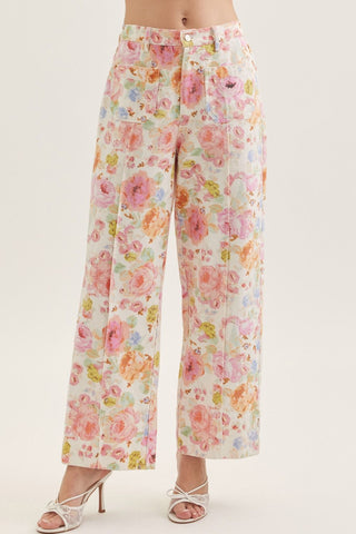 Botanical print wide leg pants featuring front patch pockets