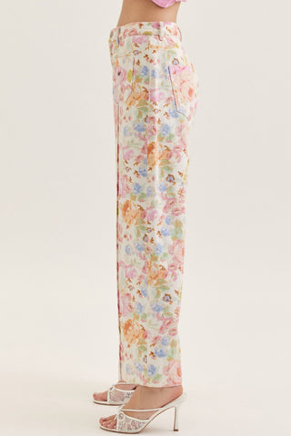Botanical print wide leg pants featuring front patch pockets