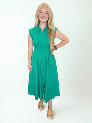 Solid sleeveless midi dress featuring collar and zipper closure at front