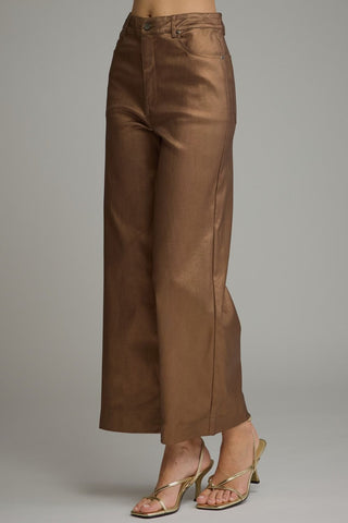 Solid metallic wide leg pants with belt loops and zip-fly button front closure