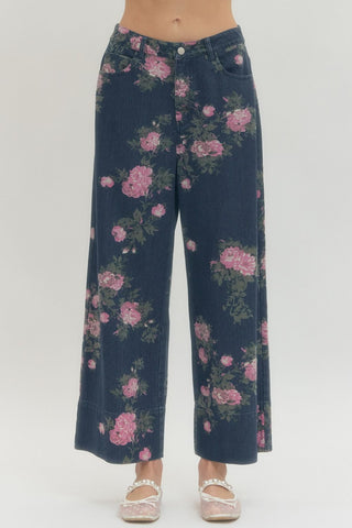 Floral print pants featuring zip-fly button front closure