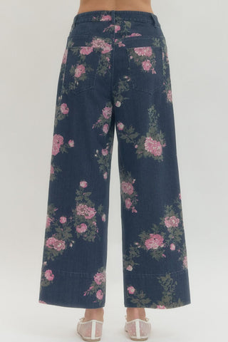 Floral print pants featuring zip-fly button front closure