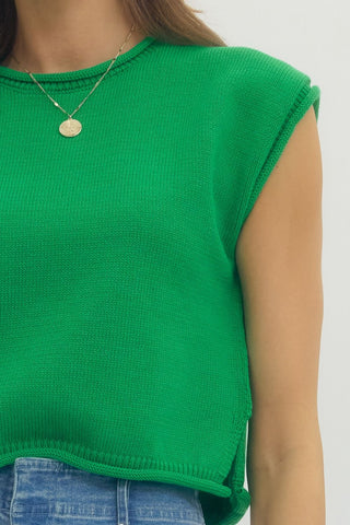 Solid cap sleeve knit top featuring rolled edge