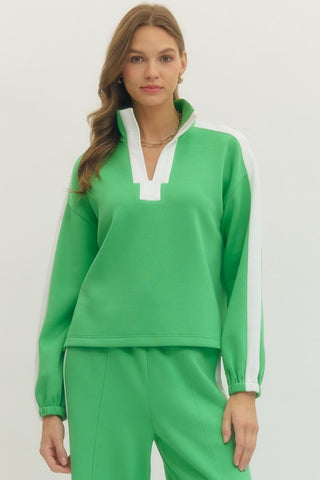 Solid long sleeve knit top featuring contrast collar and contrast stripe detail