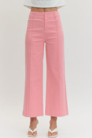 Solid high rise wide leg pants featuring front seam detail