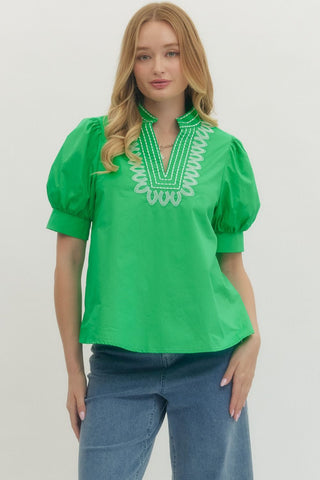 Solid cuff band short puff sleeve pullover top featuring embroidered V-neck band collar