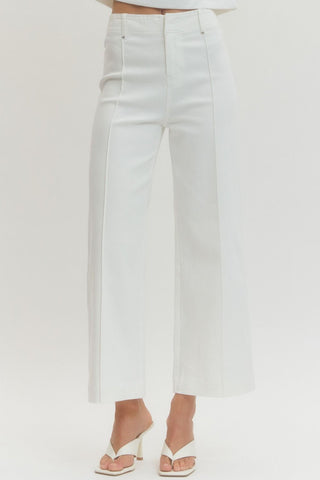 Solid high rise wide leg pants featuring front seam detail