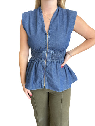 sleeveless peplum top featuring wide smocked waist and zipper