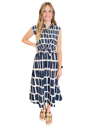 Abstract print sleeveless midi dress with collar button front with knot closure