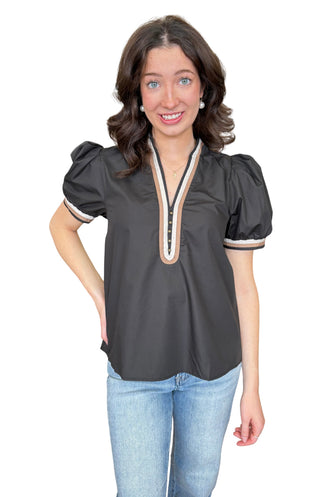 Solid short puff sleeve top featuring contrast binding V-neck detail
