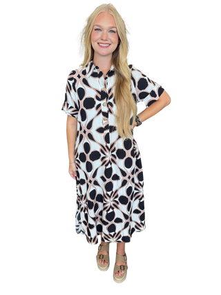 Printed short sleeve midi shirt dress featuring front button detail
