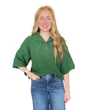 Solid ¾ sleeve sweater top with a stand collar and partial button closure
