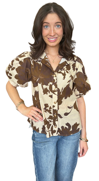 Printed floral short puff sleeve top featuring button closure at front