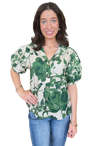 Printed floral short puff sleeve top featuring button closure at front